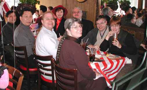 A small group of attenders fellowship over a meal after church on Sunday.