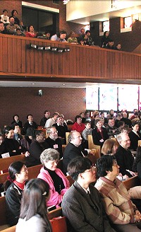 The congregation worshiping.